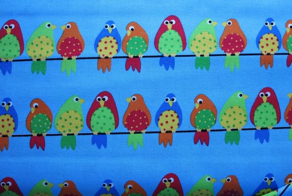 Westfalenstoff – Junge Linie - blau mit bunten Papageien