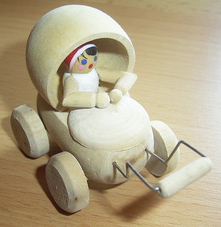 Miniatur  /  Puppenwagen + Puppe